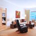 Staybridge Suites Cairo - Citystars By IHG suite with seating area and city view in Cairo