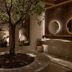 Seaside A Lifestyle Resort - Adults Only in Agia Pelagia, serene courtyard with central tree and round sinks