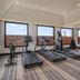 The Raintree Chennai gym with treadmills, exercise bikes and free weights