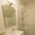 B&B Brasserie Lakerhof in Ohe en Laak bathroom with walk-in shower, sink and wall mirror