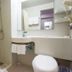 Jinjiang Inn Wuhan Wansongyuan Food Street Qushui Building bathroom with shower, sink and toilet in Wuhan