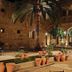 Courtyard with palm tree and small fountain at Parador de Jarandilla de la Vera, Jarandilla de la Vera