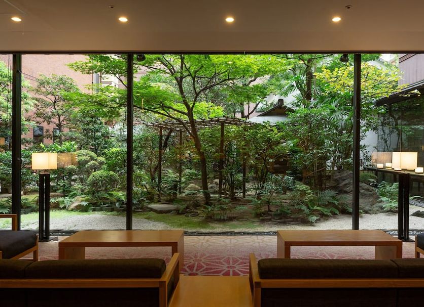 Loisir Hotel Classic Garden Kyoto Sanjo in Kyoto lobby seating with garden courtyard view