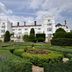 Danesfield House Hotel And Spa in Marlow with manicured gardens and a grand white facade