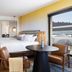 Inn at Cape Kiwanda in Pacific City guest room with king bed and balcony view