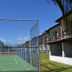 Baia Cabrália Hotel in Porto Seguro with a fenced outdoor sports court beside the building