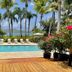 Club Seabourne Hotel in Culebra: tropical pool deck with ocean view, palm trees, and lounge chairs