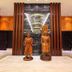 Fullon Hotel Hualien lobby with wooden statues and a stone waterfall wall in Hualien City