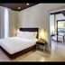 Sercotel Boulevard Vitoria guest room with king bed and adjoining room in Vitoria-Gasteiz
