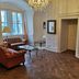 Hotel & Spa Wasserschloss Westerburg in Huy: elegant lounge with chandelier, sofas and parquet floor