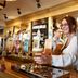The Bluebird Inn at Samlesbury in Blackburn bar staff serving a drink at the pub counter