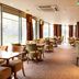 Premier Inn Nottingham Arena - London Road restaurant with large windows and neatly set tables in Nottingham