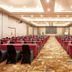 Lombok Garden Hotel in Mataram ballroom set for a conference with rows of red-covered tables
