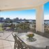 Rovera Apartments Maroochydore balcony with dining table and water views