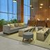 City Express Plus by Marriott Tijuana lobby lounge with sofas, low tables and tall windows
