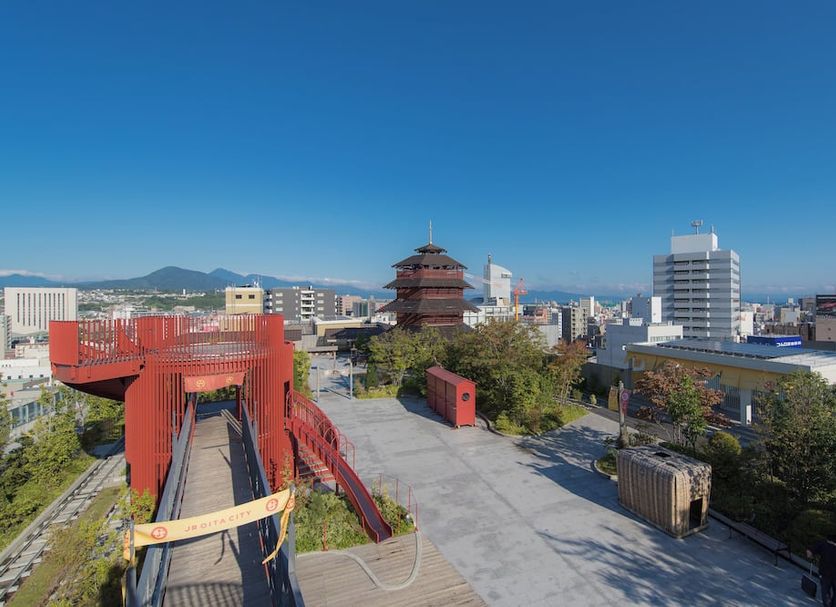 Jr Kyushu Hotel Blossom Oita rooftop terrace with city and mountain views in Ōita