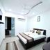 OYO 3815 Hotel Jaisingh Palace room in Indore with double bed, wall TV and air conditioning