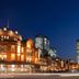 Oakhostel Zen in Tokyo with illuminated city skyline and historic station buildings at night