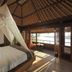 The Menjangan by LifestyleRetreats in Gerokgak, canopy bed suite with ocean-view windows