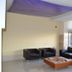 Hotel Marfil Sant Antoni de Portmany lobby with black leather seating and coffee table