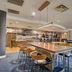 Courtyard by Marriott Cincinnati North at Union Centre in West Chester lobby lounge with bar seating and tables