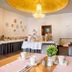 Home Hotel Dortmund breakfast room with buffet tables, coffee cups, and seating