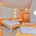 Hohenwart Forum Pforzheim room with two single beds, desk, and modern lamp