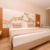 Venosa Beach Resort And Spa Didim guest room with king bed and balcony doors