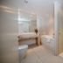 Napa Plaza Hotel, Ayia Napa: bright bathroom with walk-in shower, bathtub, vanity and toilet