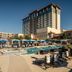 Thunder Valley Casino Resort in Lincoln with outdoor pool, blue umbrellas, and tower building