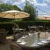 Outdoor dining terrace at Hotel Du Vin & Bistro Tunbridge Wells in Royal Tunbridge Wells with umbrellas and tables