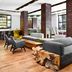 Melia Ibirapuera lounge in Sao Paulo with bar, modern seating, and wood accent table