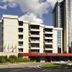 Hotel Miracorgo in Vila Real with modern high-rise facade and entrance, under a partly cloudy sky