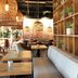 Original Sokos Hotel Rikala in Salo dining area with woven pendant lights and potted plant shelves
