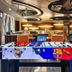 Foosball table in In One City Inn, Taichung City, with lounge seating and bar-style interior