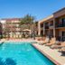 Courtyard by Marriott Dallas-Fort Worth/Bedford pool courtyard with lounge chairs in Bedford