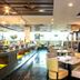 Promenade Hotel Bintulu dining area with buffet counter, tables, and chairs in Bintulu