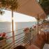 Le Palazzine Hotel in Vlorë with seaside terrace dining and sunset ocean views