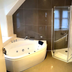 Loch Kinord Hotel, Aboyne: corner whirlpool tub and glass walk-in shower in bathroom