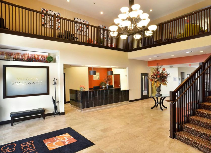 Berlin Grande Hotel lobby in Berlin with chandelier, mezzanine railing and staircase