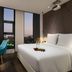 Yitel Yangzhou Qionghua Building Grand Canal Dongguan Street Experience Branch room with city view at dusk
