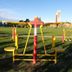 Rayentray Grand Hotel in Puerto Madryn features outdoor fitness equipment on a grassy lawn.
