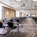 pentahotel Eisenach meeting room in Eisenach with rows of conference tables and black chairs