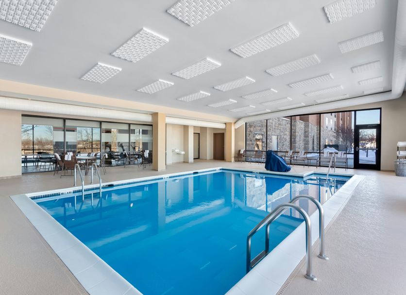 Hampton Inn & Suites Chicago Deer Park indoor pool with large windows and city views