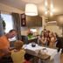 hu I Pini village in Fiano Romano kitchen-dining area with a family seated at a table