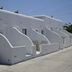 Margie Mykonos Hotel in Mykonos: white Cycladic rooms with private outdoor terraces along a walkway