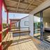 Kaikoura TOP 10 Holiday Park family cabin with wooden deck and sliding glass door in Kaikoura