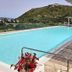 A Point Porto Ercole Resort & Spa in Porto Ercole with outdoor pool and hill view