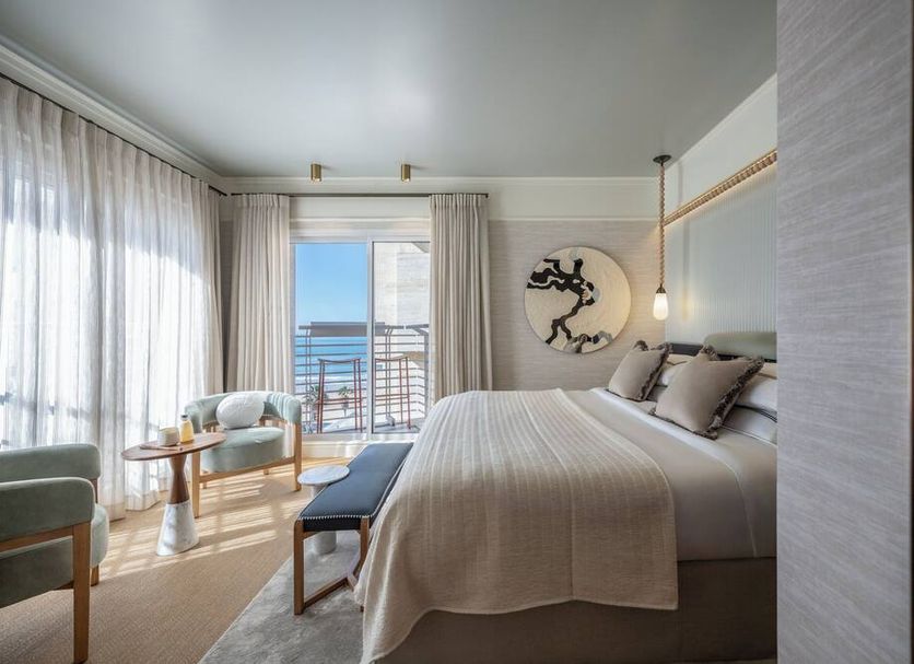 Savoy Sea Side Hotel Tel Aviv room with balcony sea view, king bed and seating area