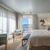 Savoy Sea Side Hotel Tel Aviv room with balcony sea view, king bed and seating area